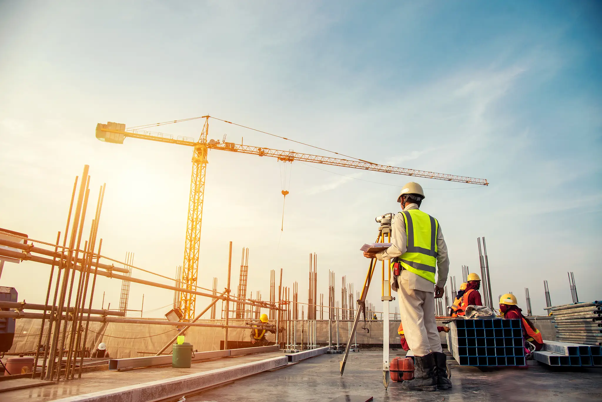 Land surveyor working on-site with a builder in Sydney